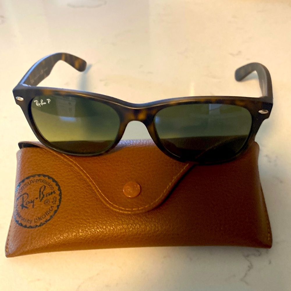 Ray-Ban sunglasses. Used but still in very good condition. See pics.